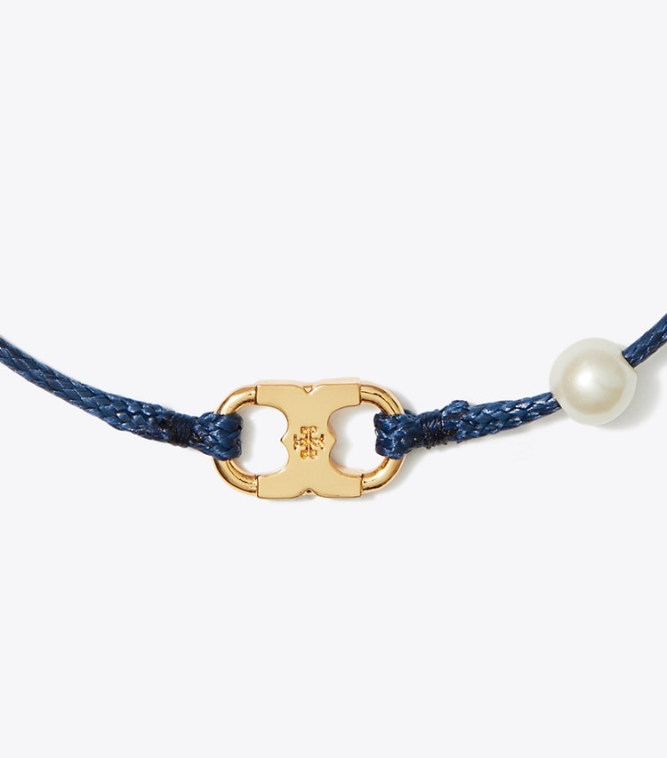 TORY BURCH EMBRACE AMBITION PEARL BRACELET - Tory Gold / Tory Navy / Creme